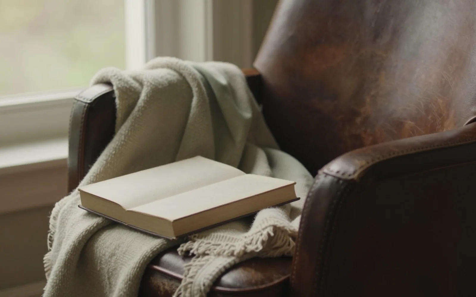 A reading chair beside a window